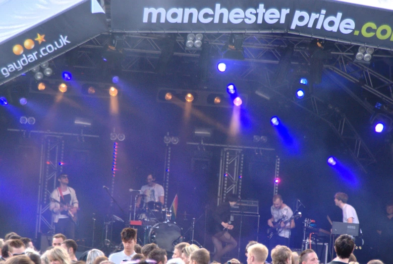 a man standing on top of a stage on top of a stage