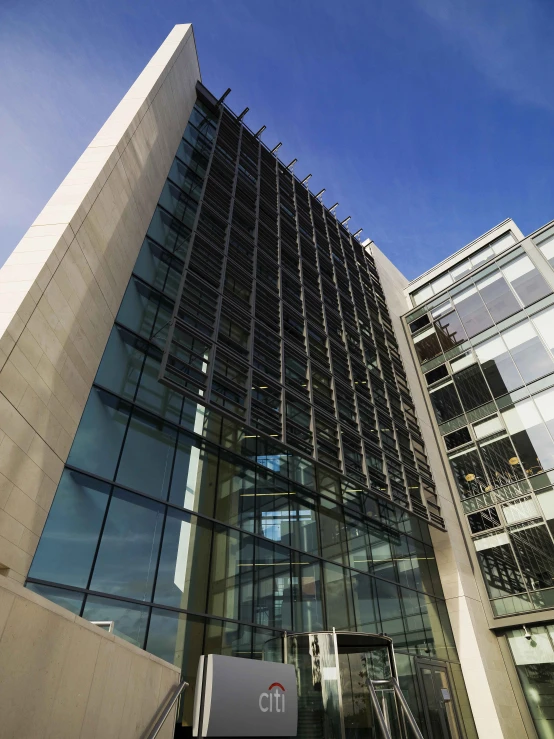 a very large building with some glass windows