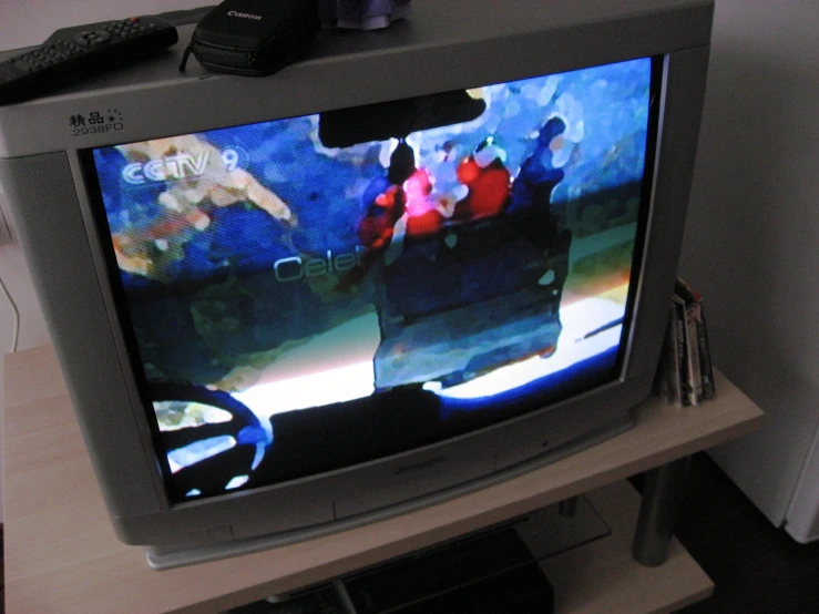 a flat screen television with children on the screen
