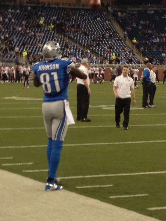 a football player on the field during a game