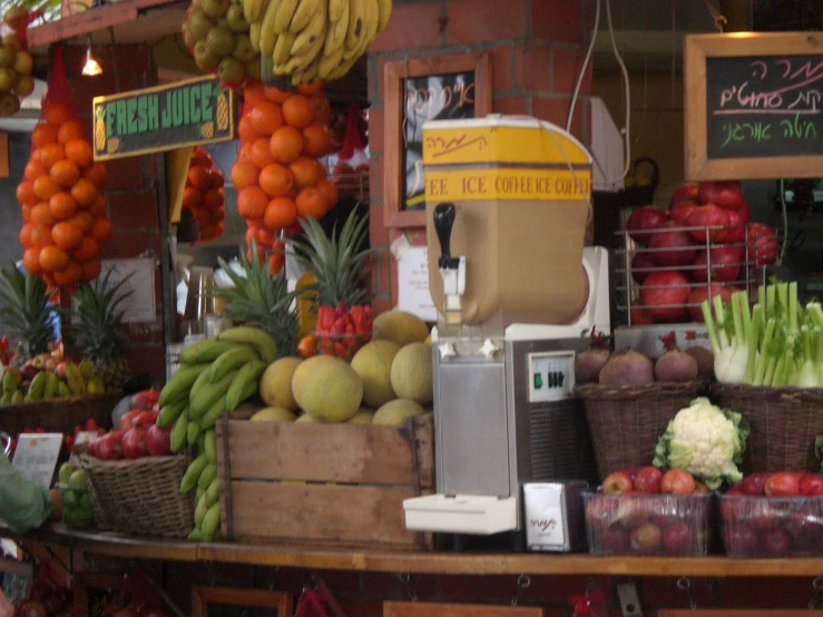 an assortment of fruits are on display at the fruit market