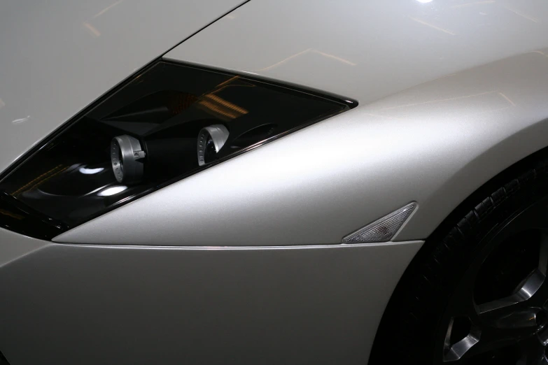 a closeup view of the side of a sports car