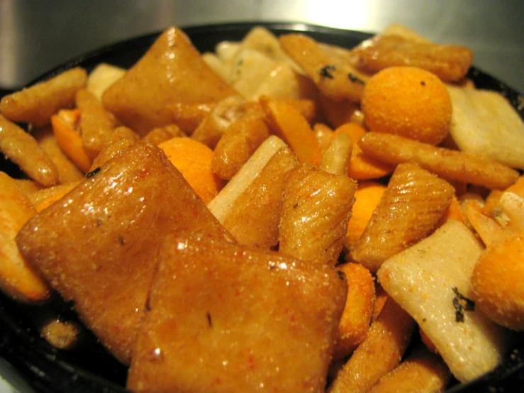 a plate filled with croutons and oranges