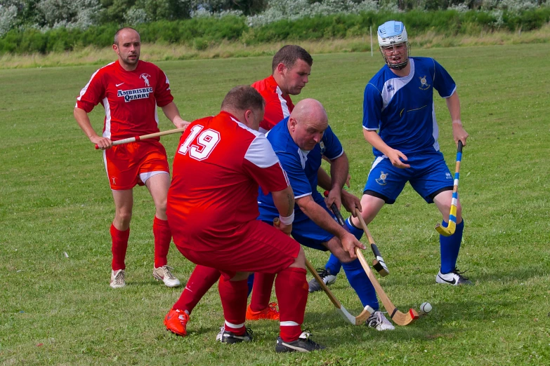 several players fight over the ball during a game