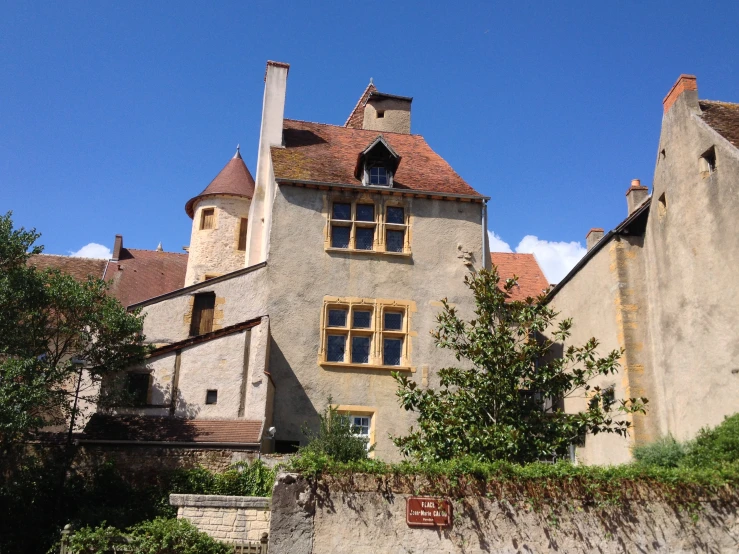 there is a building with lots of windows and a steeple