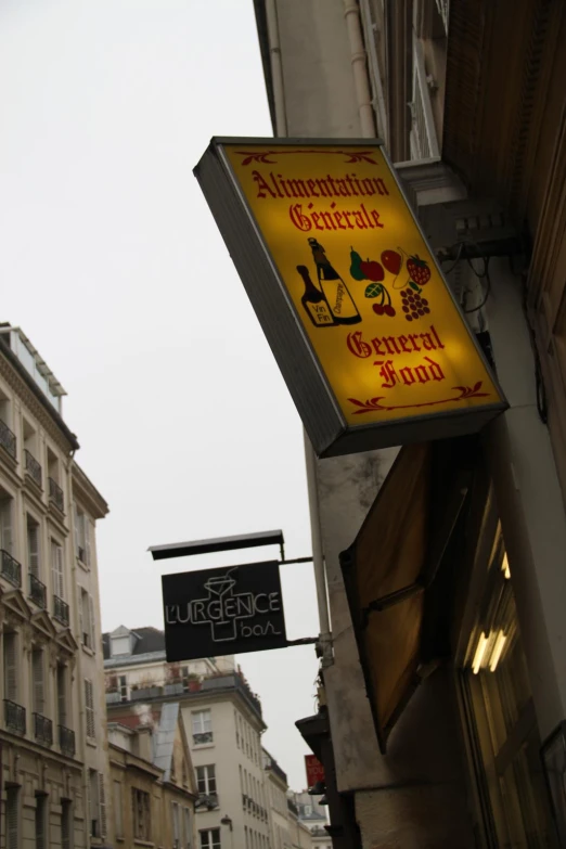 a restaurant sign for the city wine shop