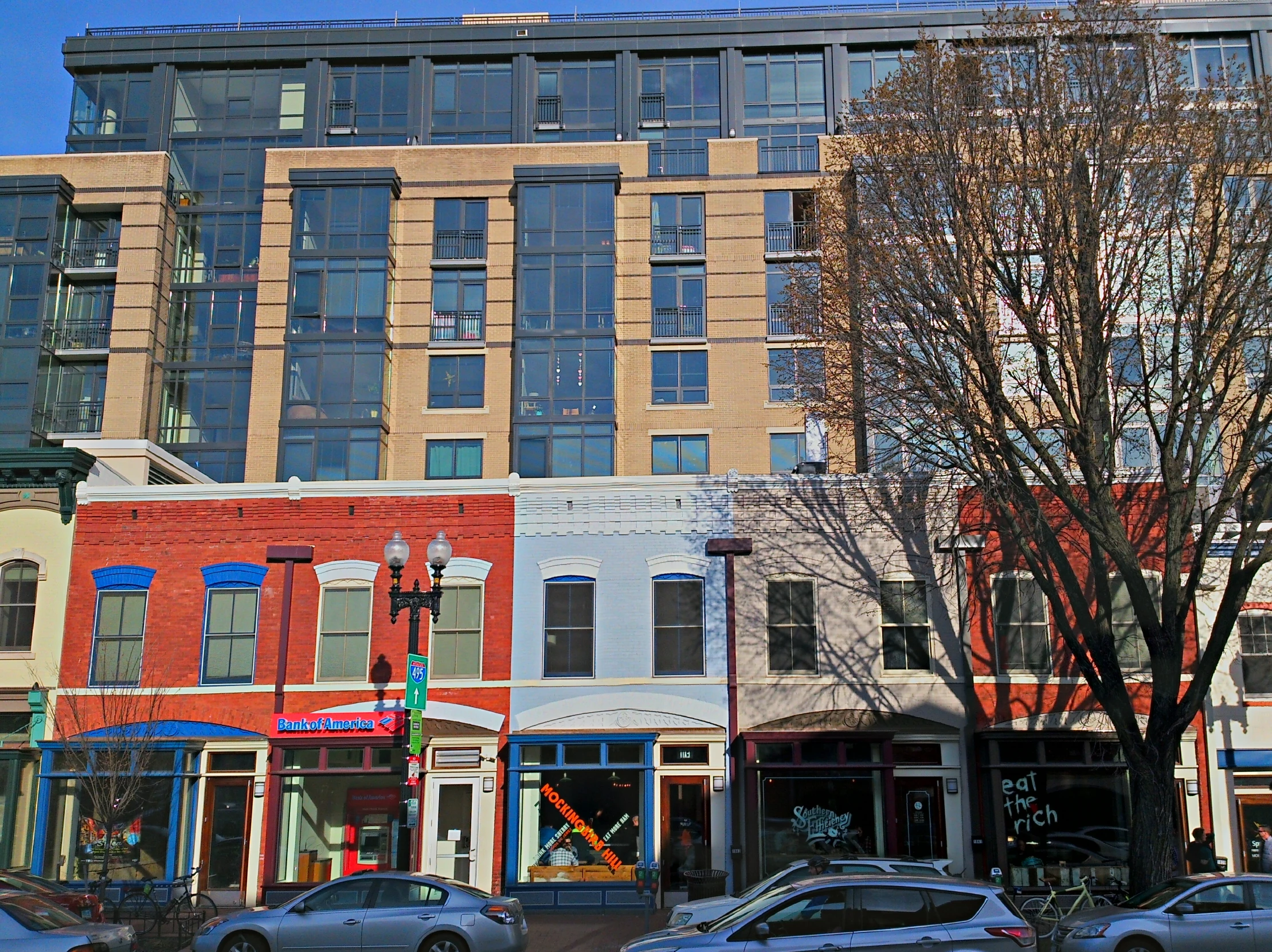 several cars parked in front of a building