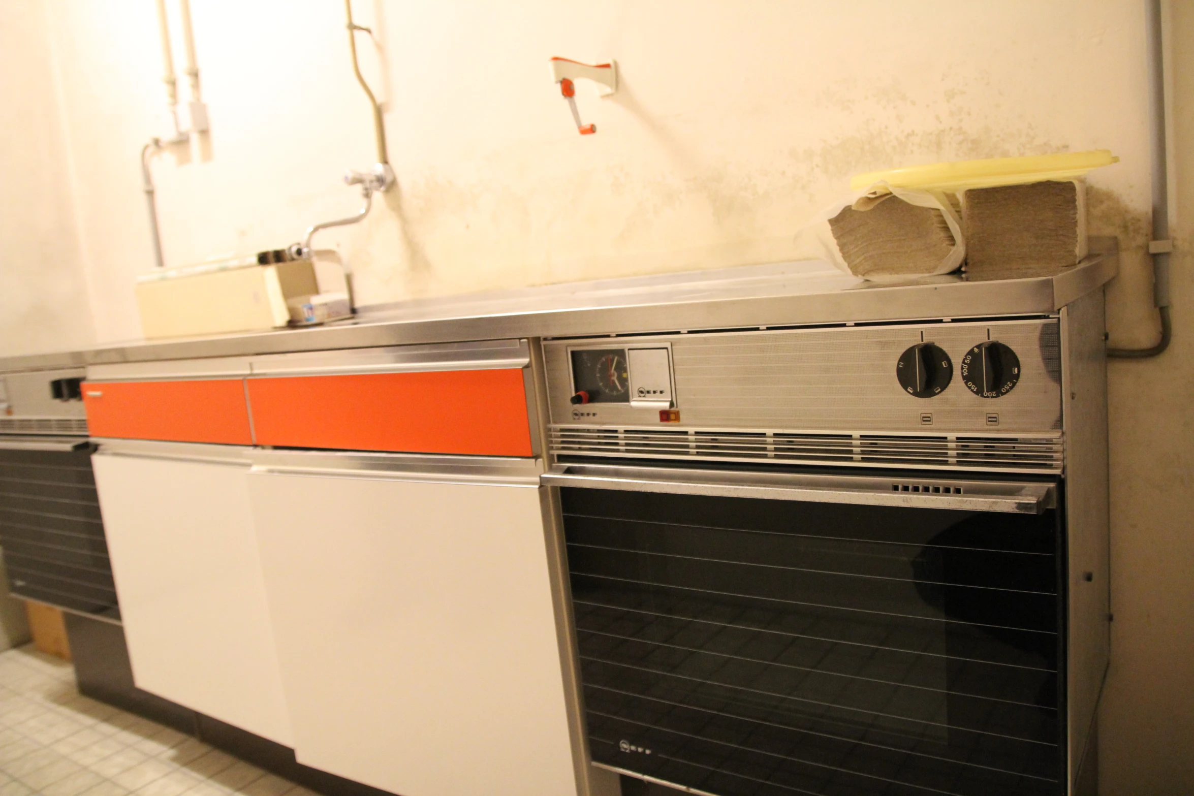 a kitchen with a large oven and stove in it