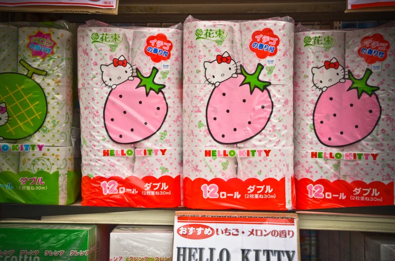 a pile of hello kitty bags of food in the store