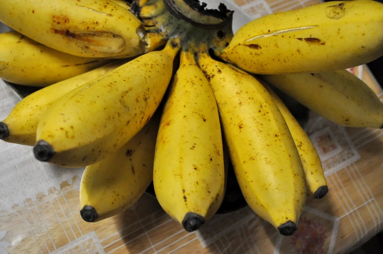 the banana is sitting on a table ready to be eaten