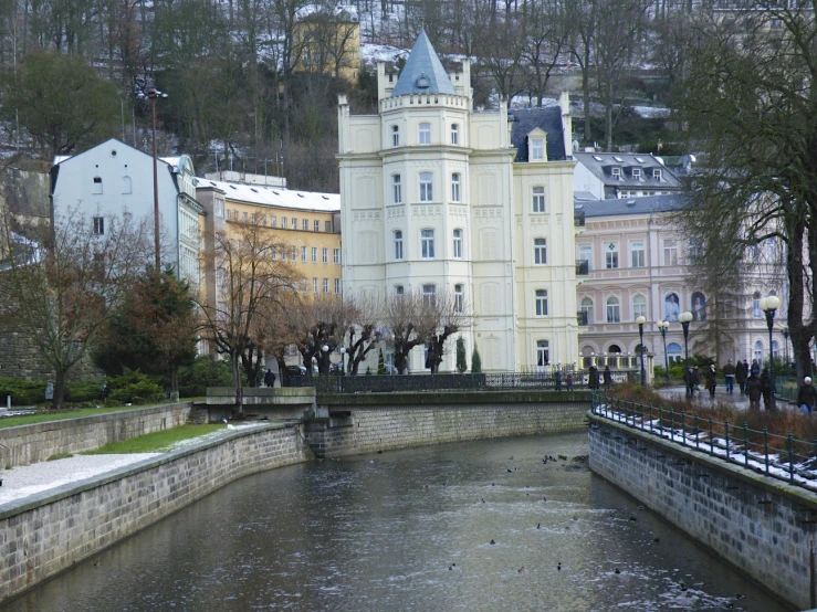 an old water way with buildings around it