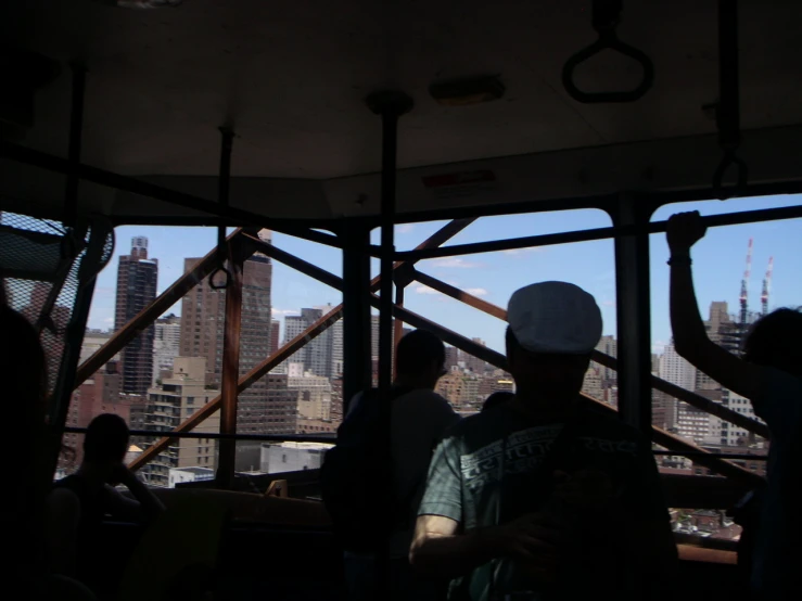 people on the top floor of a high rise building