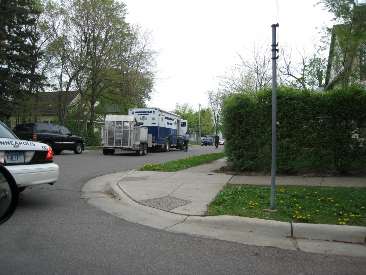 some trucks parked in front of a residential area