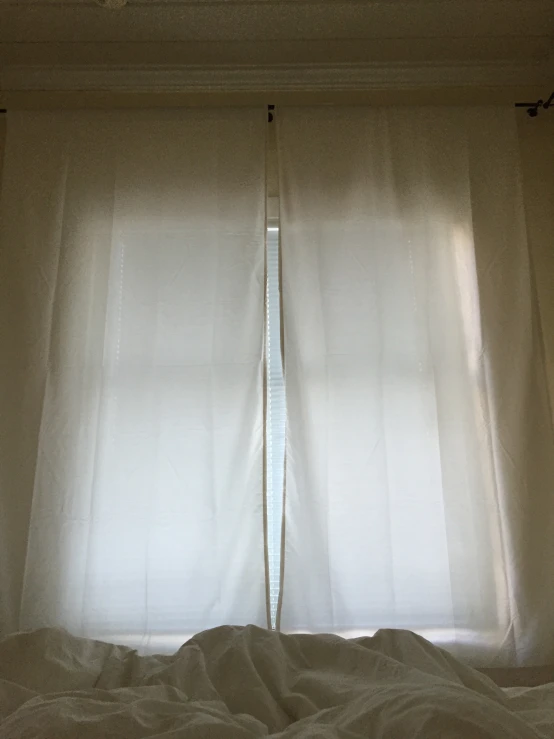 a curtain with two rows of curtains behind it