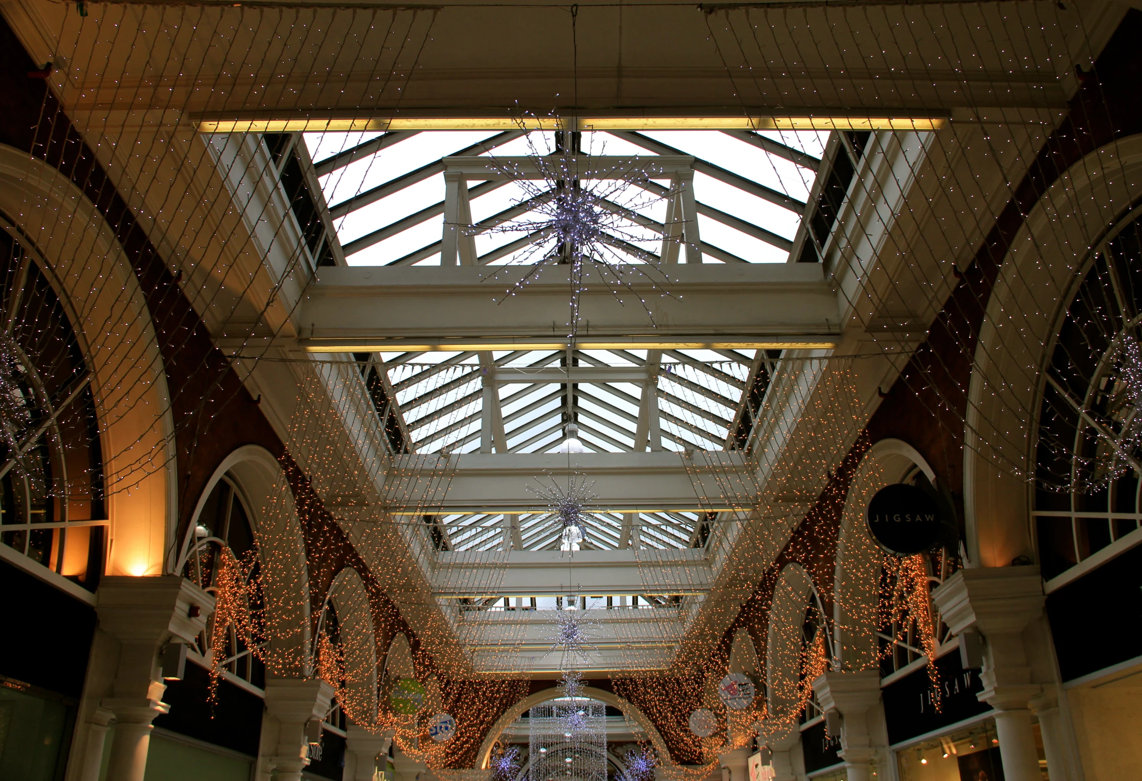 a hallway in the middle of an elegant building