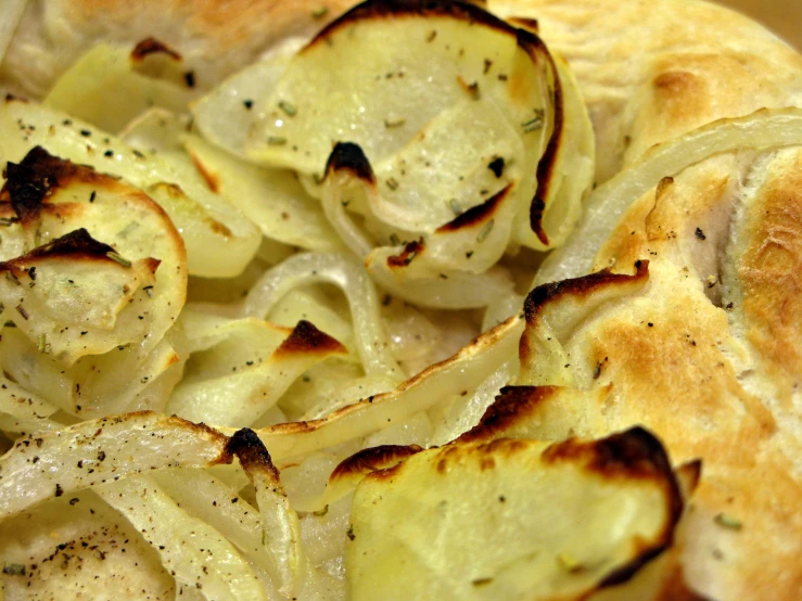 some potato chips have been placed on a flatbread