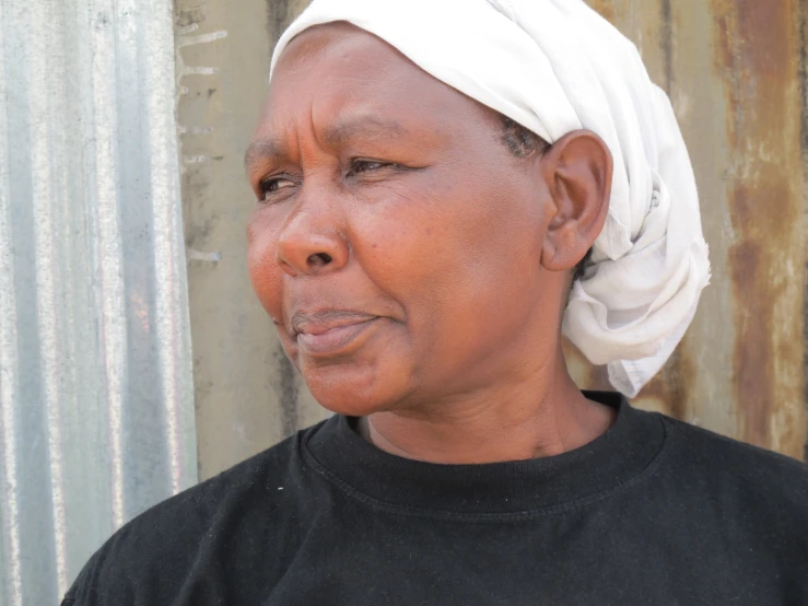 a woman with a head scarf on