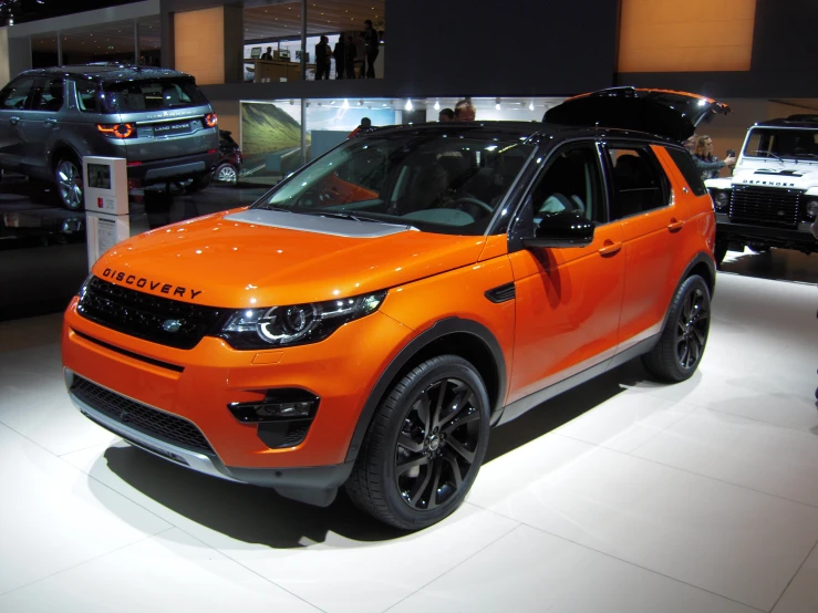 a range rover is on display at a car show