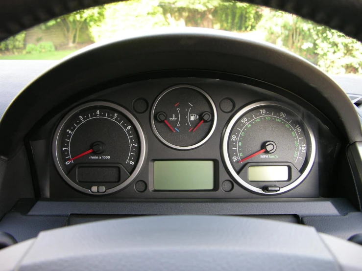 a dash board and meters in a vehicle