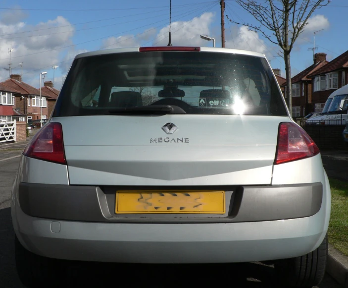 the rear of a car in a residential area