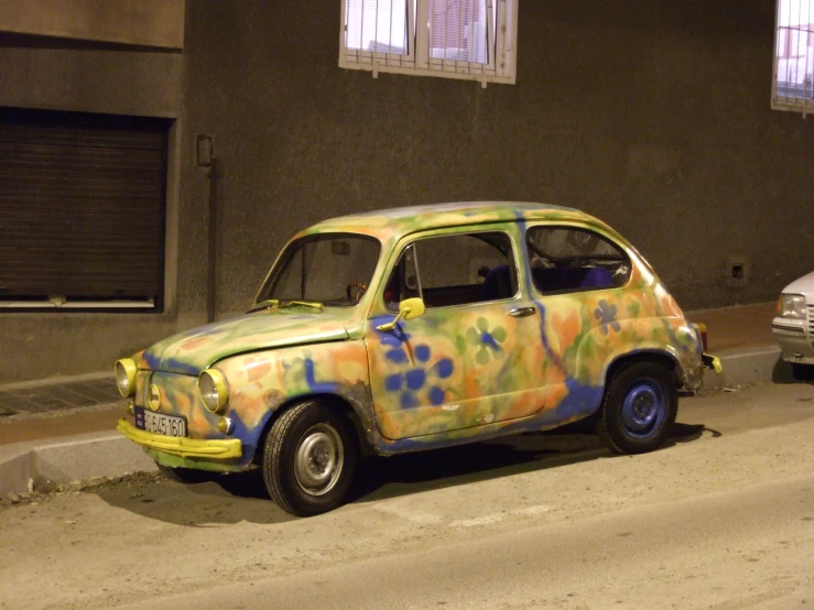 a car with a multicolored paint job on it