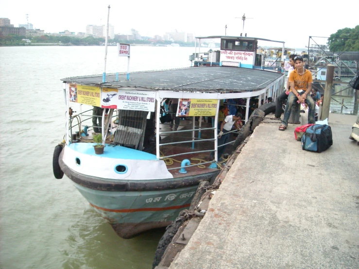 the ferry boat is stopped at the dock