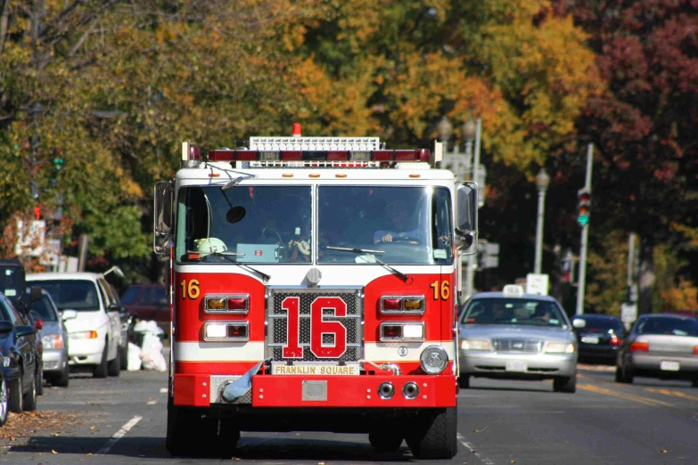 fire truck turning in the street at an intersection