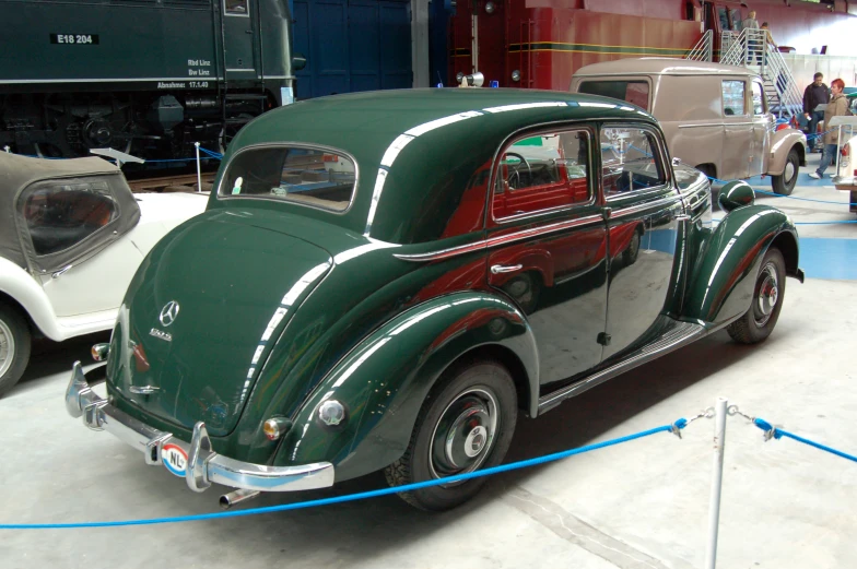 the old car is on display at the auto show