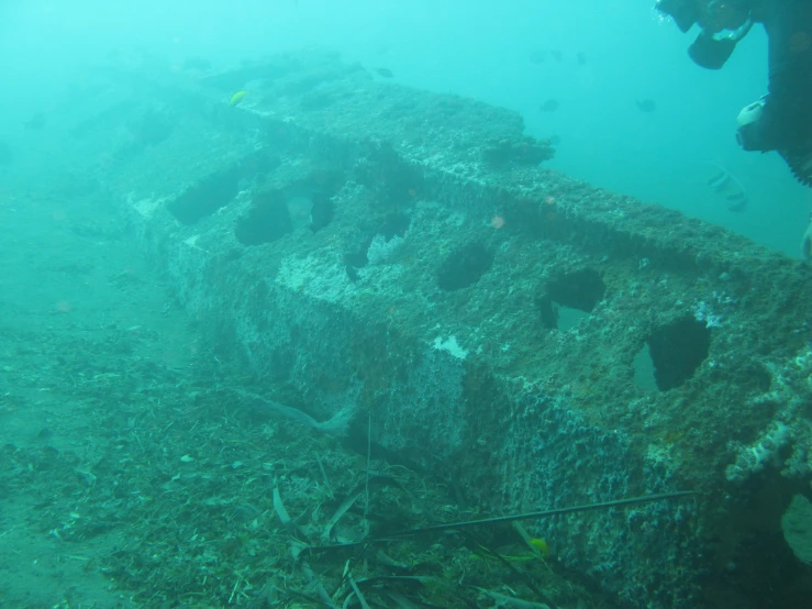 a large ship with multiple holes in the side