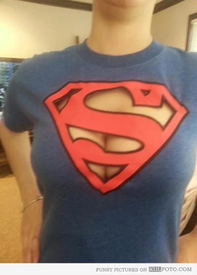 a person wearing a t - shirt with a super man on it