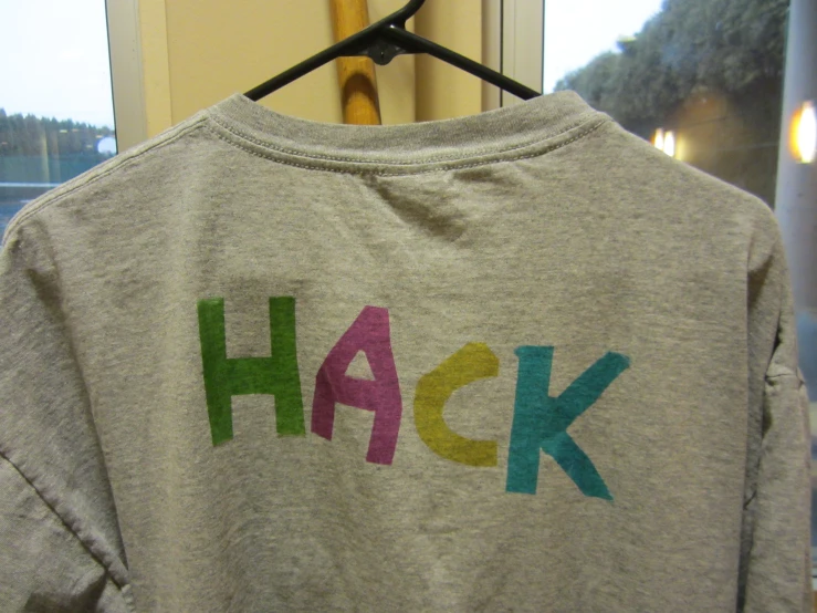 t - shirt that says hack on it and has a message