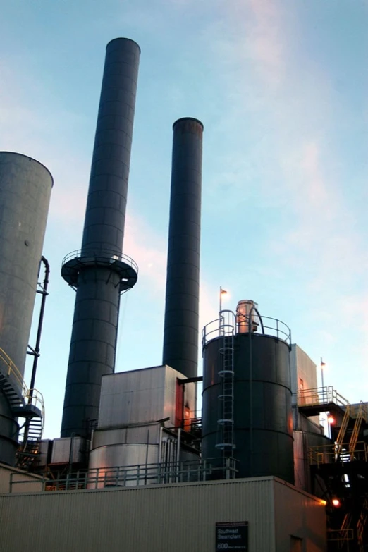 this is a view of factory buildings with chimneys