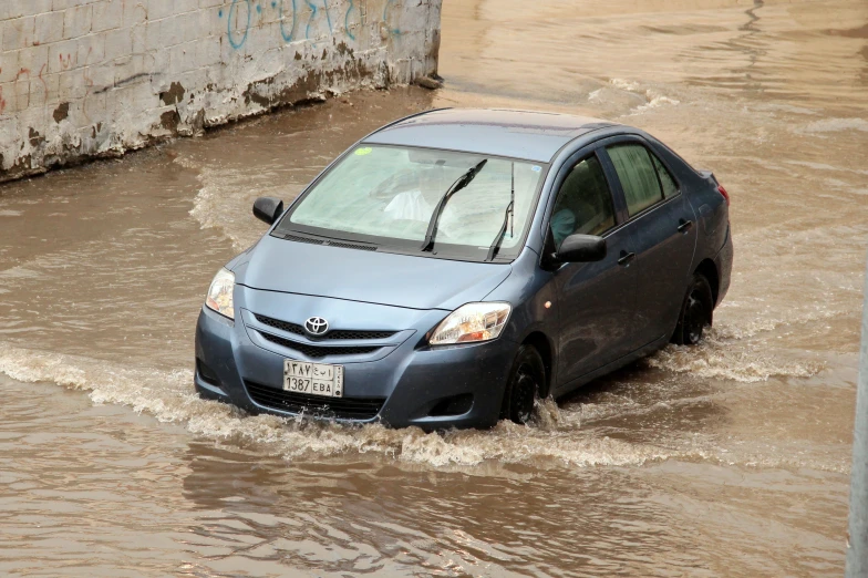 a car in a body of water
