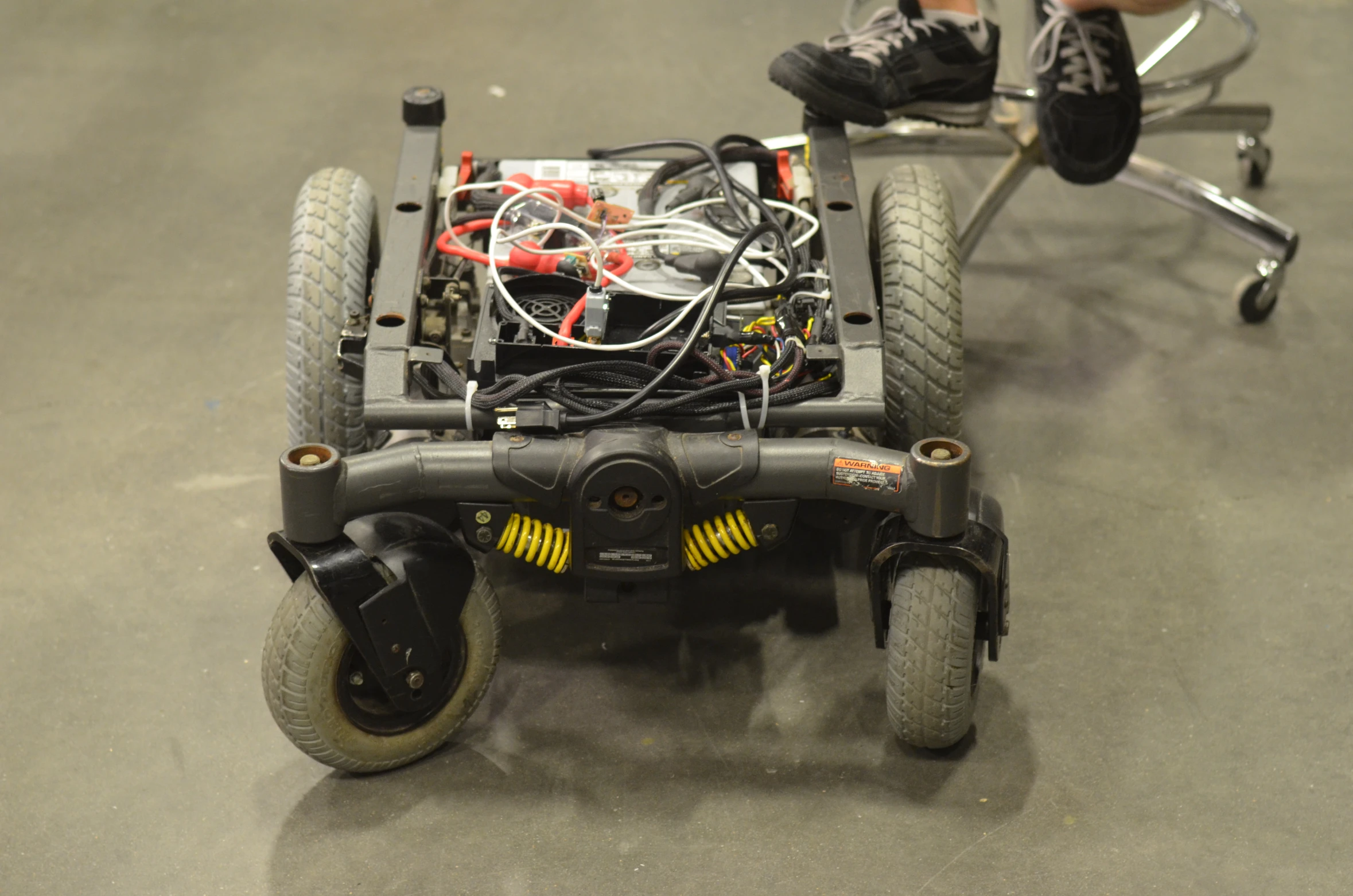 the cart is loaded with electrical gadgets on wheels