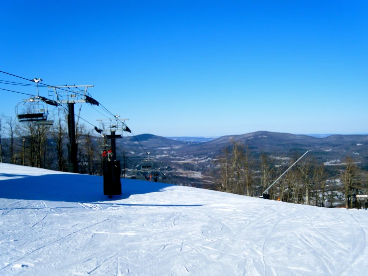 there is a snowboarder riding down a hill