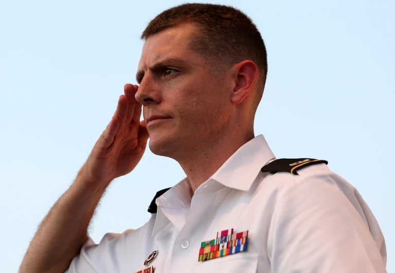 a man in uniform saluting the air force