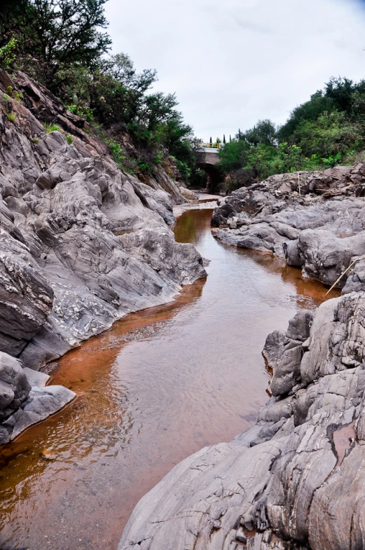 a river that has some rocks in it