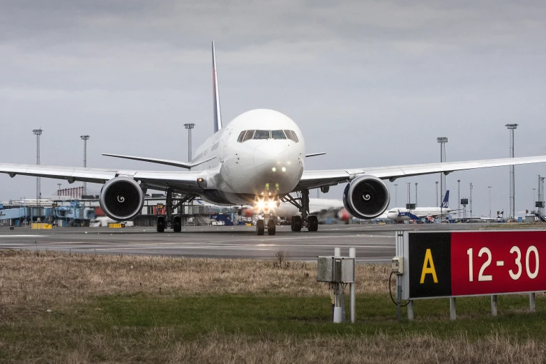 there is a large jet that is sitting at the airport