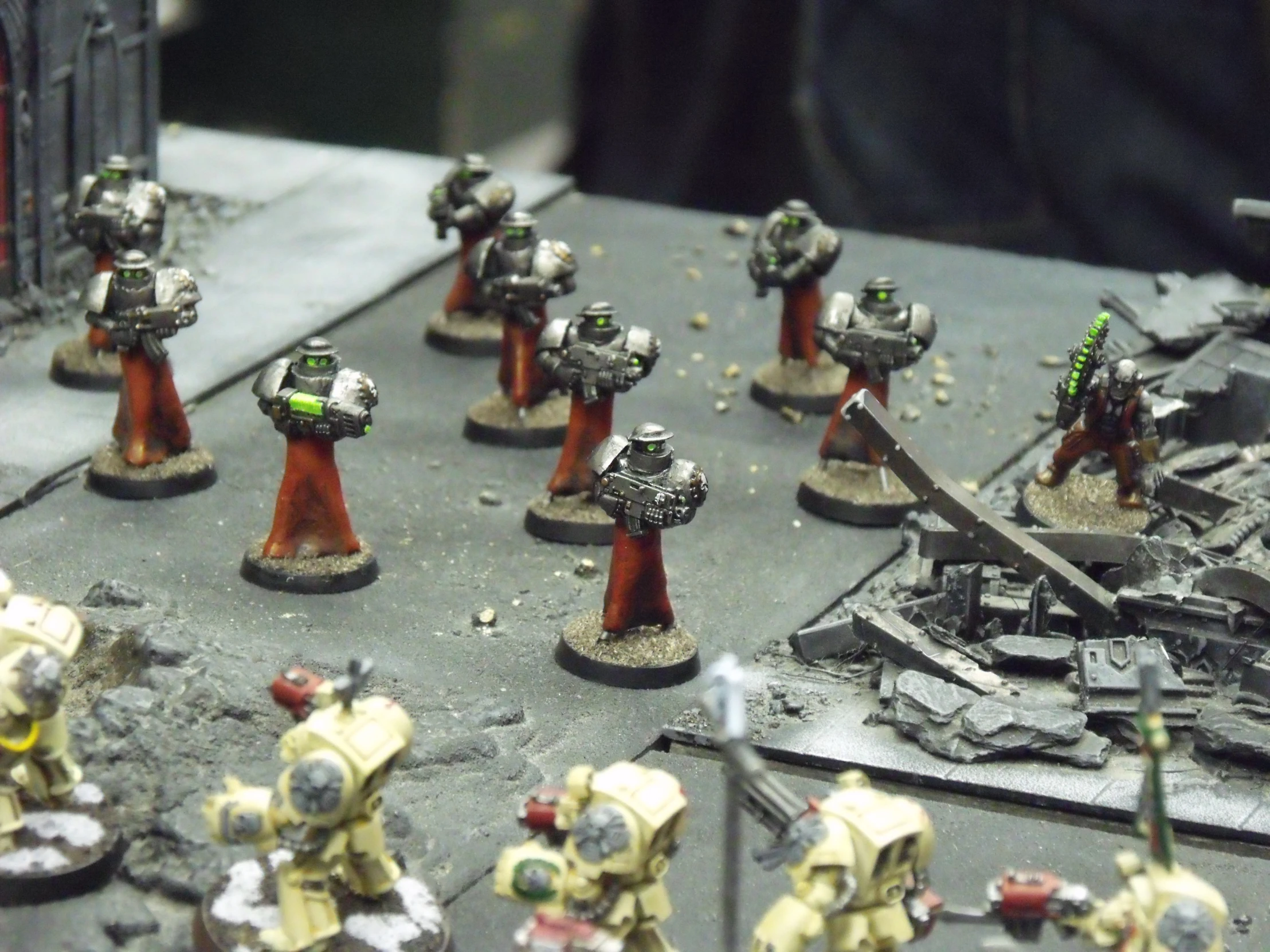 a tabletop of warhammers with small tanks around them