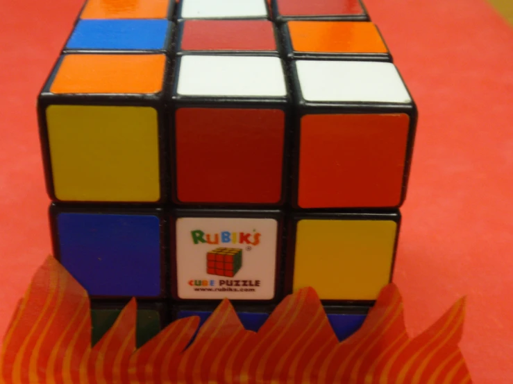a rubik cube sitting on top of a table