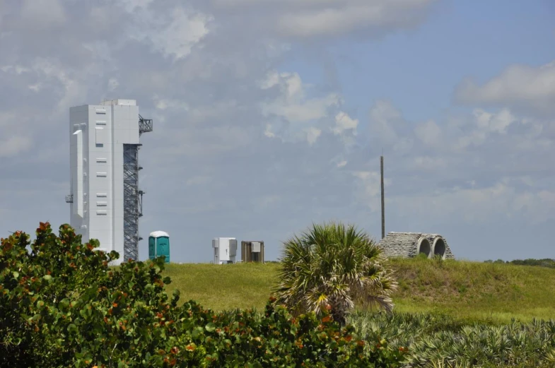 the building has a round metal structure in the center of it