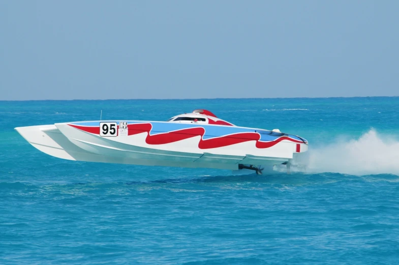 an aircraft with a painted body, in the ocean