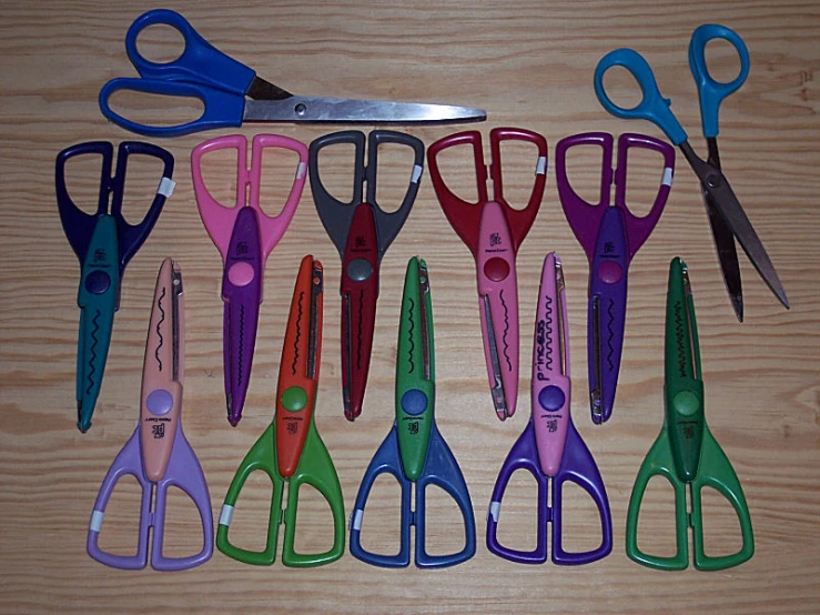 the scissors are all colored and have different shapes