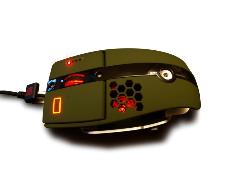 an illuminated computer mouse has a red light