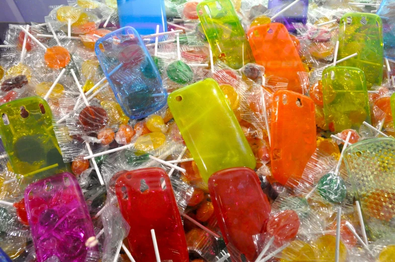 lollipops on a table full of them are brightly colored