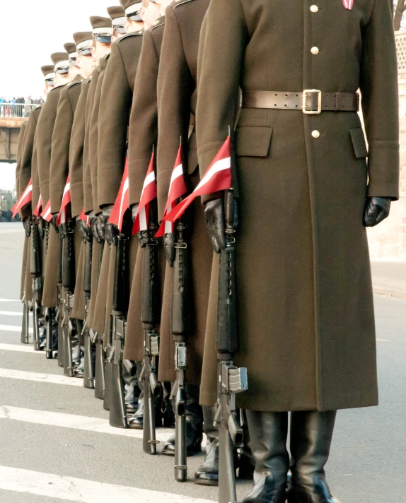 a group of uniformed men standing next to each other