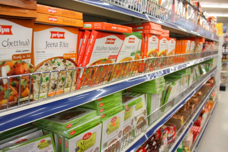 the shelves in a store with food items for sale