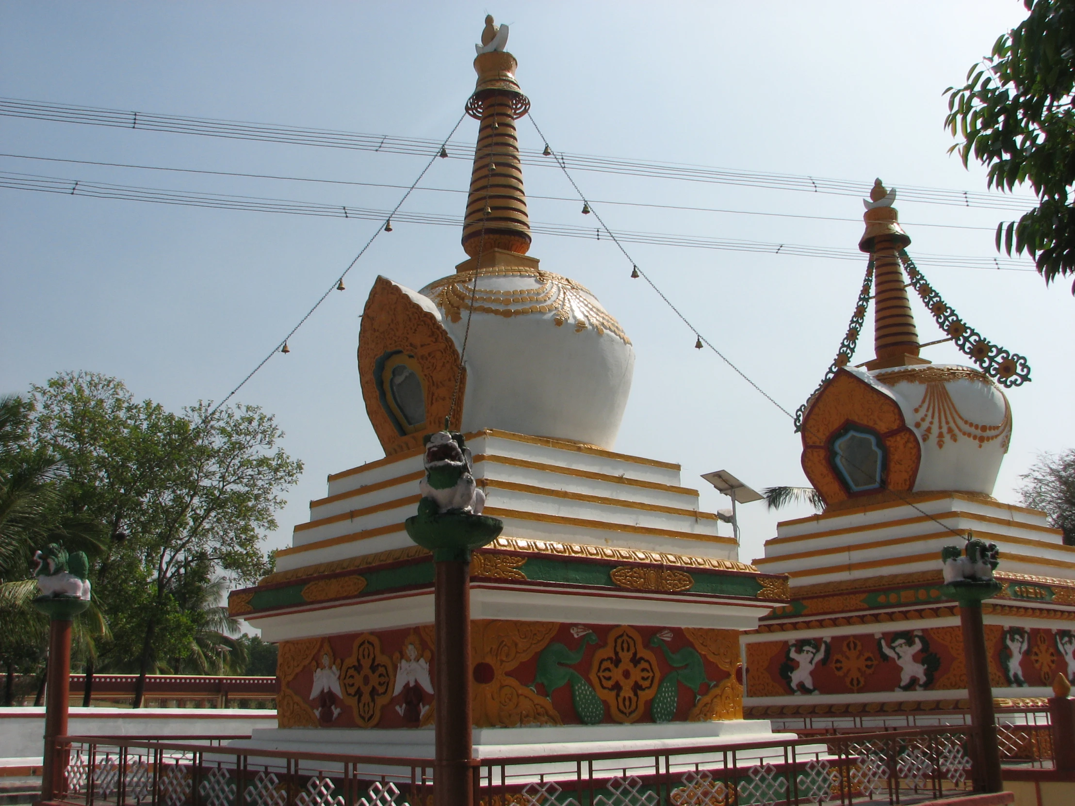 a golden and white church has elaborate decorations on it