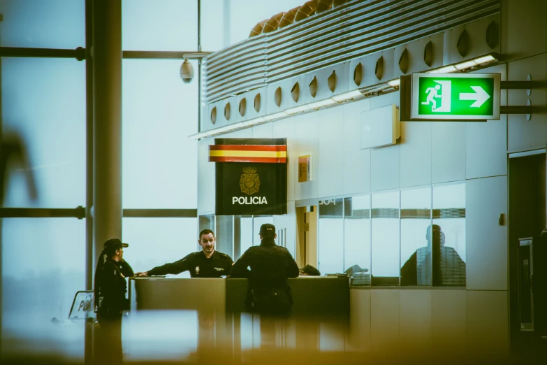 a man and woman are at the front counter