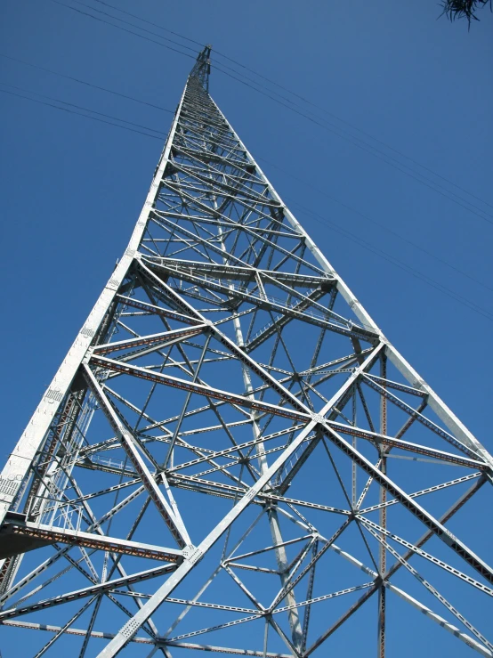 a very tall metal structure on the side of a building